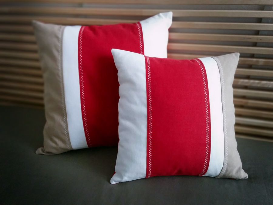 Two pillows in stripes of red, white and beige canvas